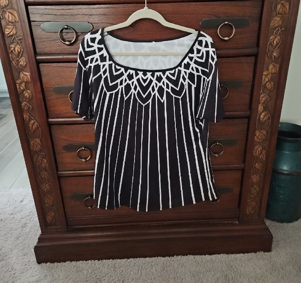 Black and White Graphic Tee with Intricate Neckline